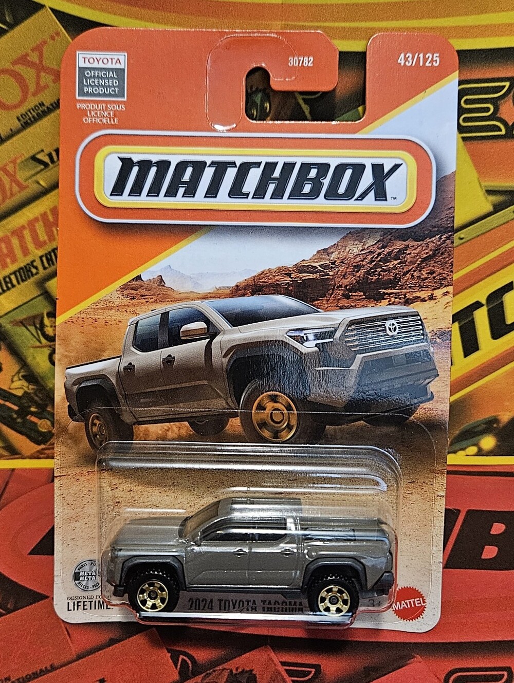 Matchbox 2024 Toyota Tacoma  Truck - Gray and Gold Wheels